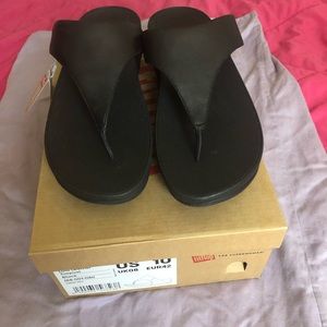 Brand new in box. FitFlop black Lulu leather toe.